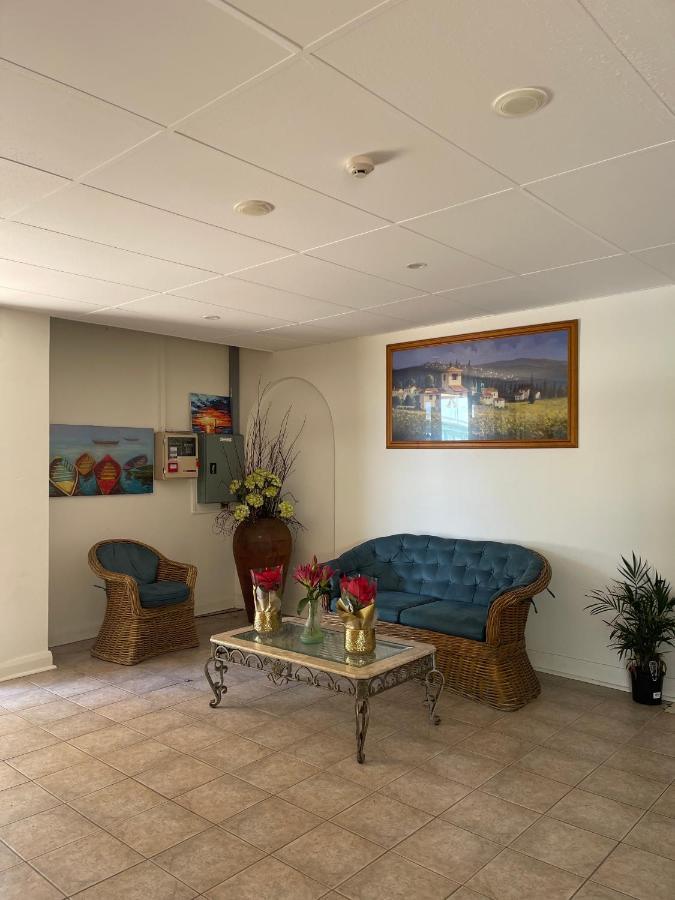 El Lago Waters Hotel Entrance Extérieur photo